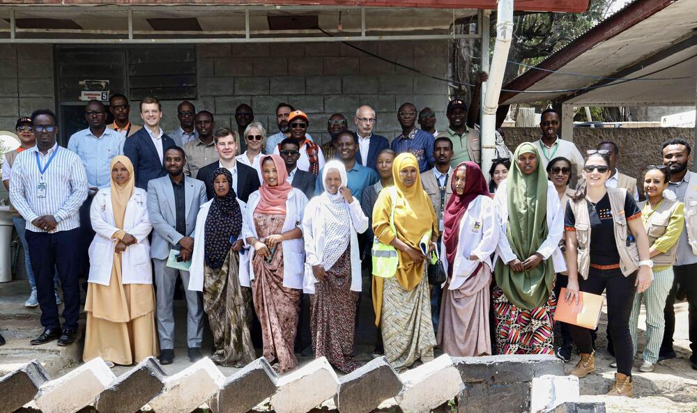 The high-level delegates with health professionals at Bombas Health Center, Somali Region. 