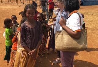 Ms. Bettina Maas, UNFPA Country Representative, with IDP girls