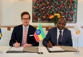 H.E. Hans Henrik L., Ambassador of Sweden to Ethiopia, and Mr. Taiwo Oluyomi, UNFPA D. Rep, during the signing ceremony. 