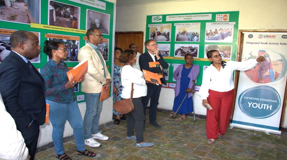 Delegation being briefed at the ECDD Regional Coordination Office