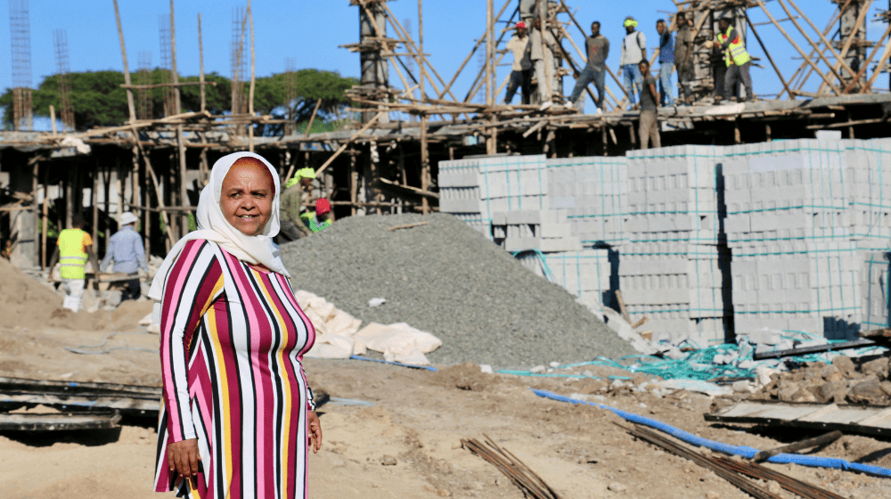 Maria Munir showing the construction of a new safe shelter for survivors of GBV at the outskirts of Addis Ababa, Ethiopia. 