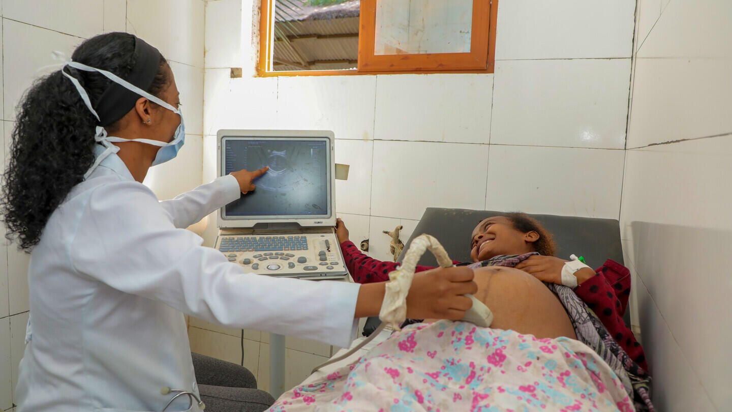 A pregnant woman attending antenatal care 