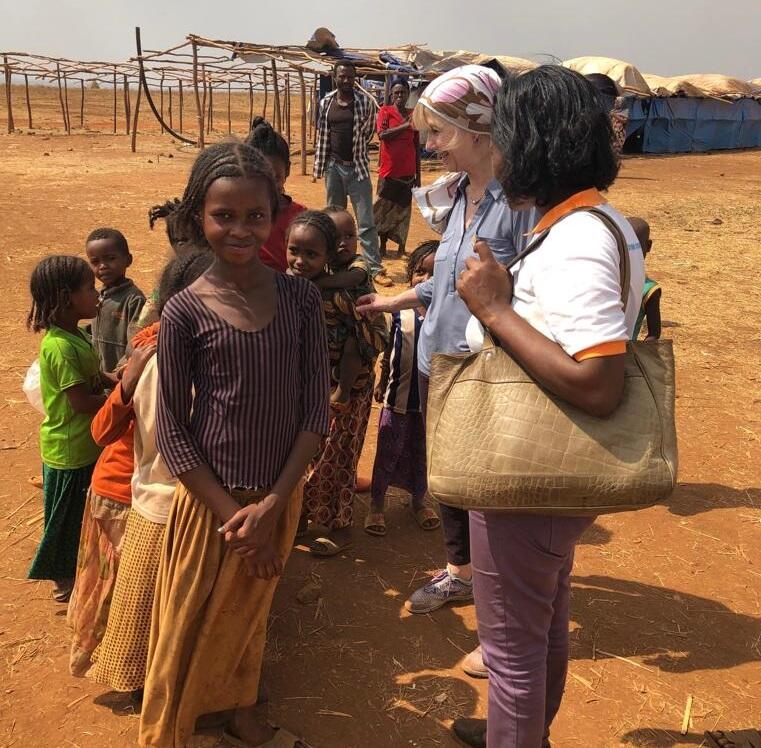 Ms. Bettina Maas, UNFPA Country Representative, with IDP girls