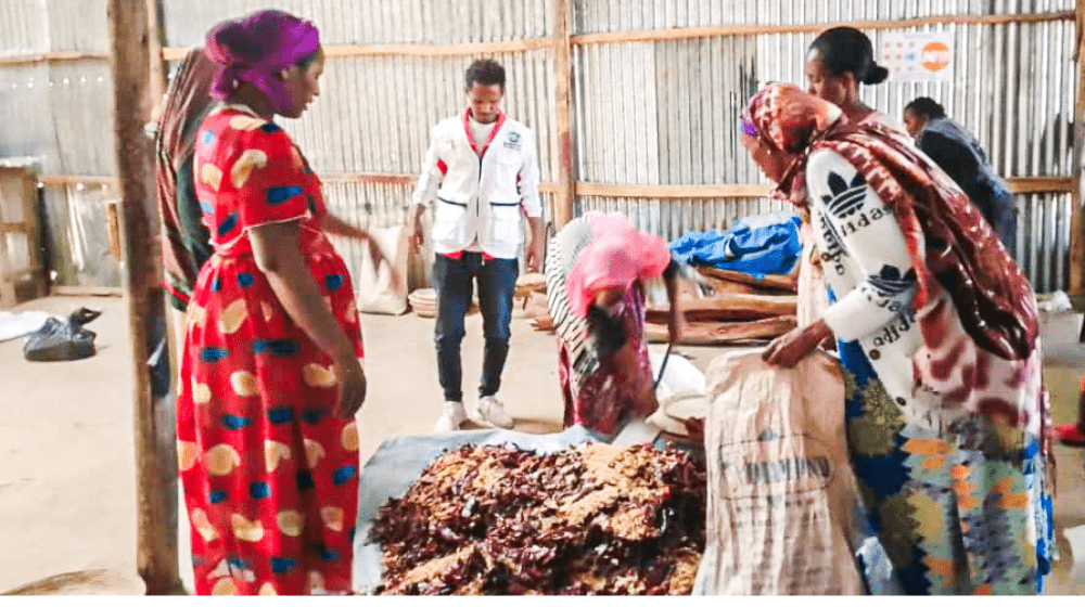 Asqual Hailay (left) and her friends at the training site. 